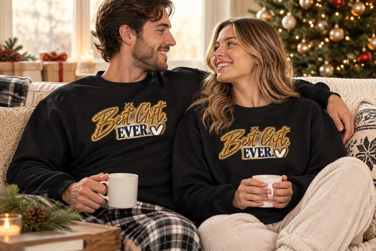 Couple wearing Best Gift Ever sweatshirts at home