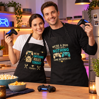 Matching gamer-couple aprons styled with game-night details